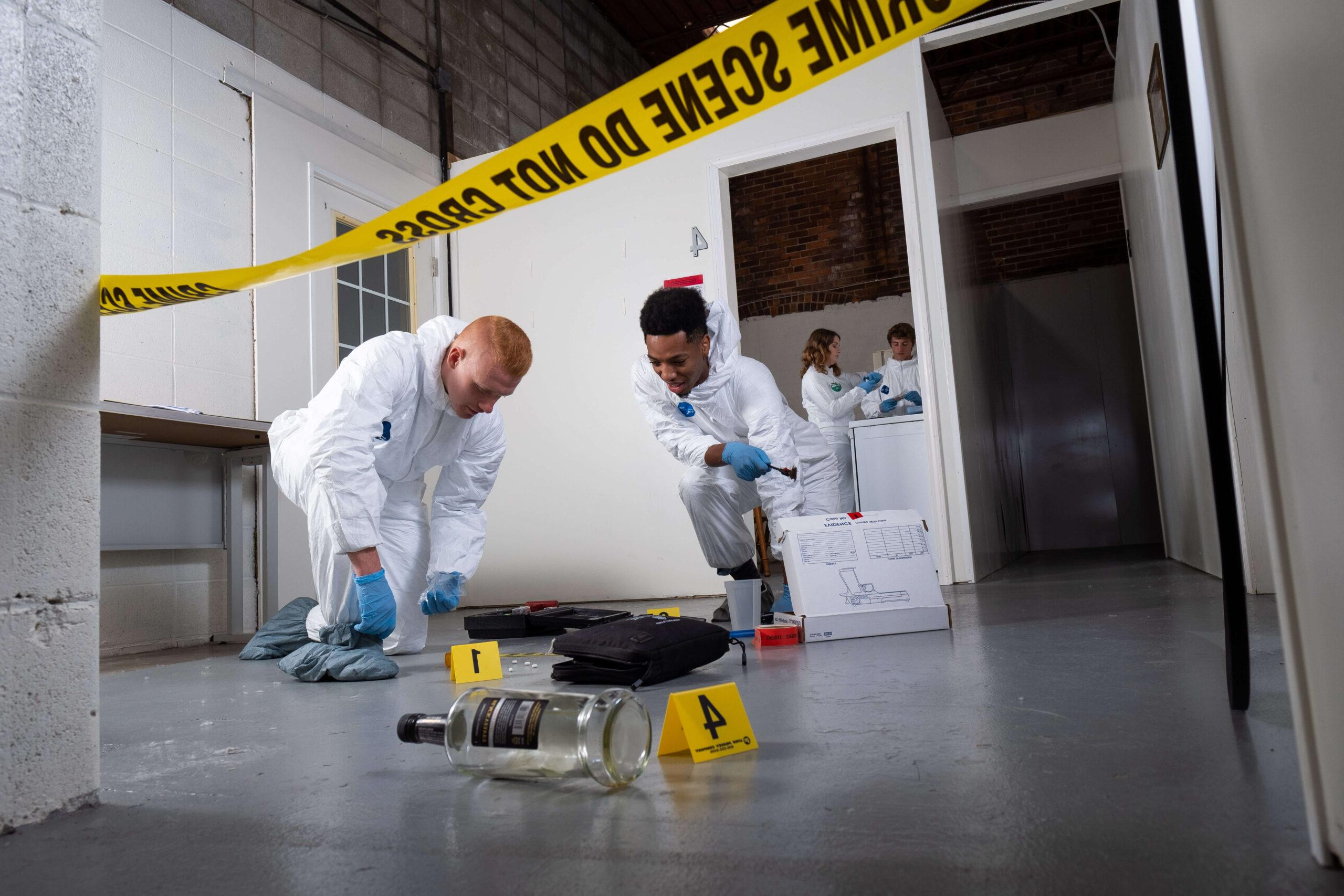 college students collecting evidence in lab